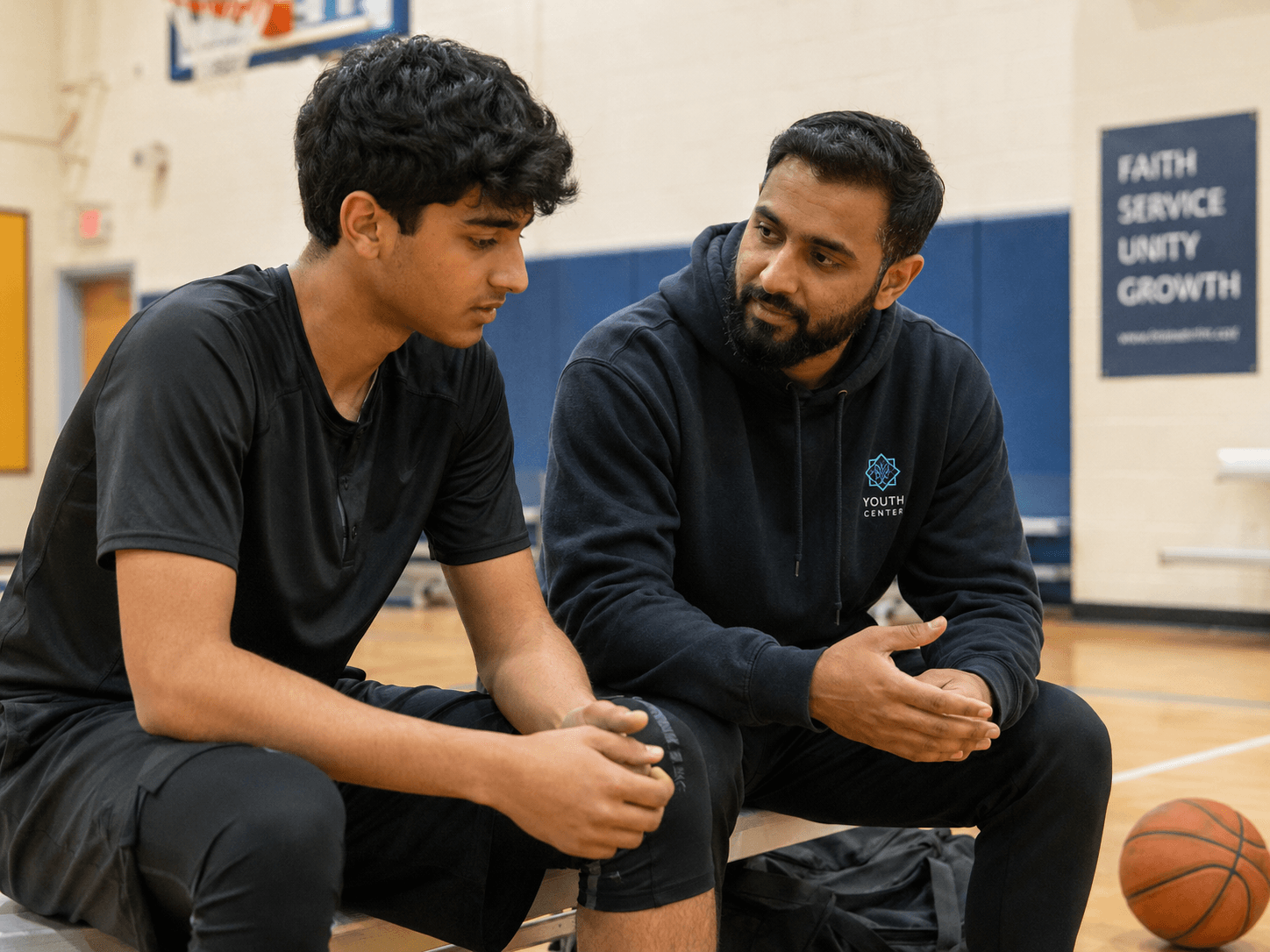 Young Muslim receiving compassionate mentorship and emotional support